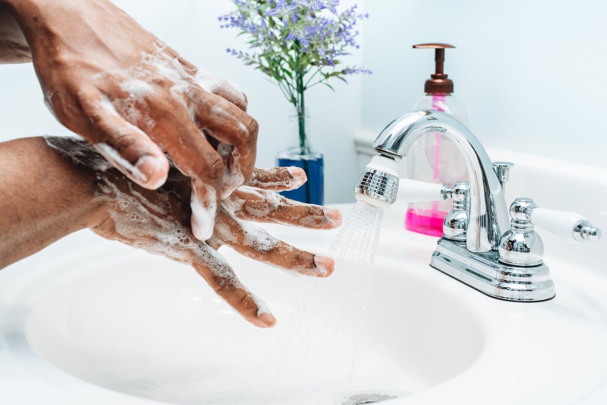 person washing their hands