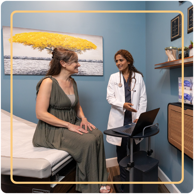 Dr. Sayana with a Patient